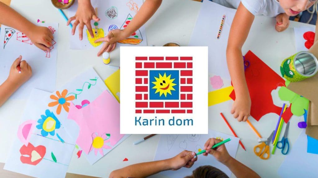 Children creating artwork during a therapy session at Karin Dom Foundation