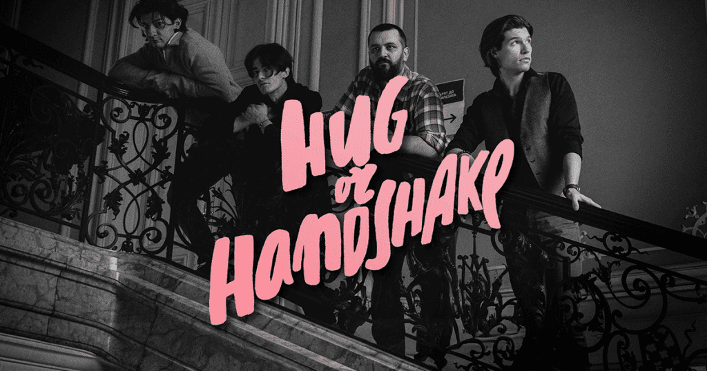 Indie band Hug or Handshake posing together.