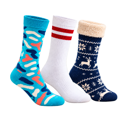 Turquoise patterned crew sock, white sports sock with red stripes and navy jacquard sock with a cream fleece cuff.